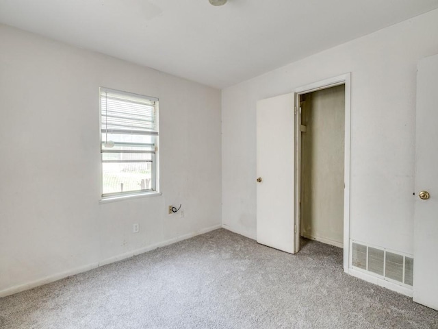 2203 Gould Ave, Fort Worth, TX 76164 - unfurnished bedroom featuring carpet flooring and baseboards