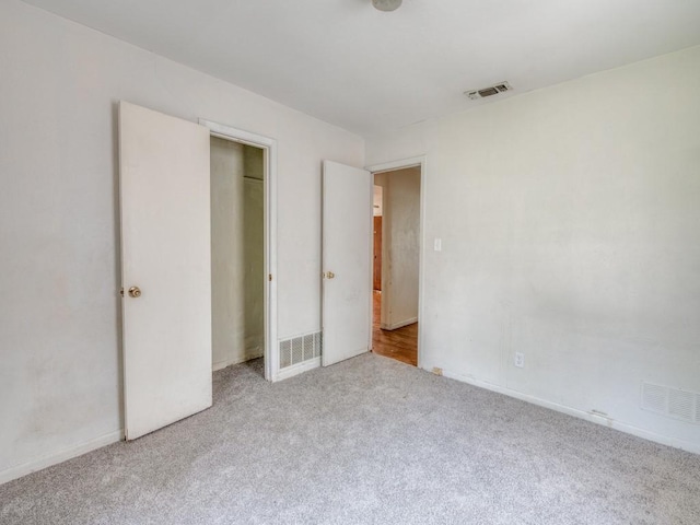 2203 Gould Ave, Fort Worth, TX 76164 - unfurnished bedroom featuring carpet flooring and baseboards