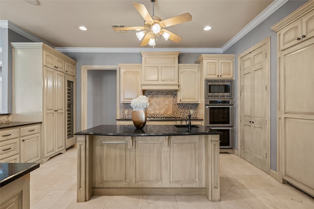 6021 Canyon Trl, Waco, TX 76657 - kitchen featuring cream cabinetry, stainless steel appliances, decorative backsplash, a ceiling fan, and crown molding