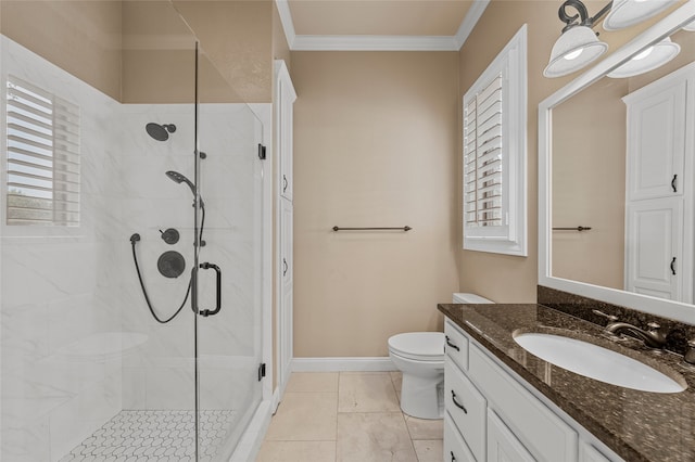 6021 Canyon Trl, Waco, TX 76657 - full bathroom featuring crown molding, a shower stall, vanity, toilet, and baseboards
