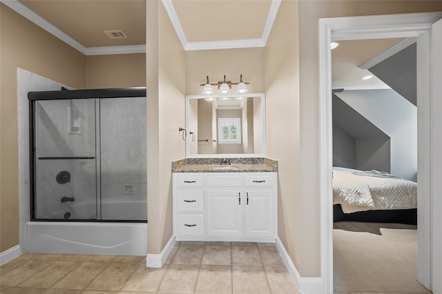 6021 Canyon Trl, Waco, TX 76657 - ensuite bathroom with crown molding, baseboards, bath / shower combo with glass door, vanity, and tile patterned flooring