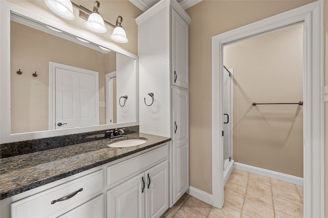 6021 Canyon Trl, Waco, TX 76657 - bathroom with vanity, a stall shower, baseboards, and tile patterned flooring