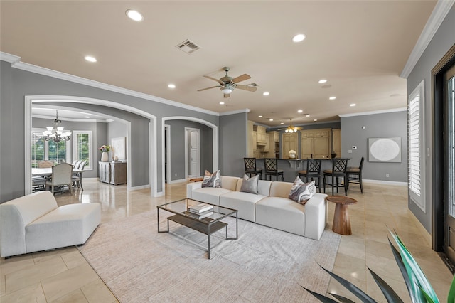 6021 Canyon Trl, Waco, TX 76657 - living area with arched walkways, a chandelier, recessed lighting, ornamental molding, and baseboards