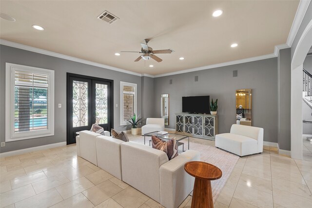 6021 Canyon Trl, Waco, TX 76657 - living room featuring ceiling fan, recessed lighting, baseboards, light tile patterned floors, and crown molding