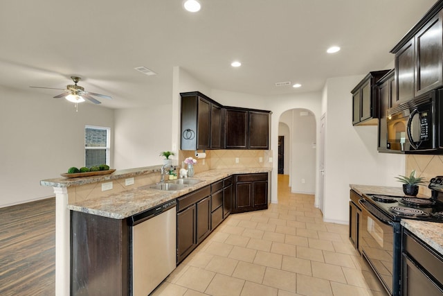 8213 White Hart Dr, Fort Worth, TX 76179 - kitchen featuring black appliances, arched walkways, ceiling fan, backsplash, and a peninsula