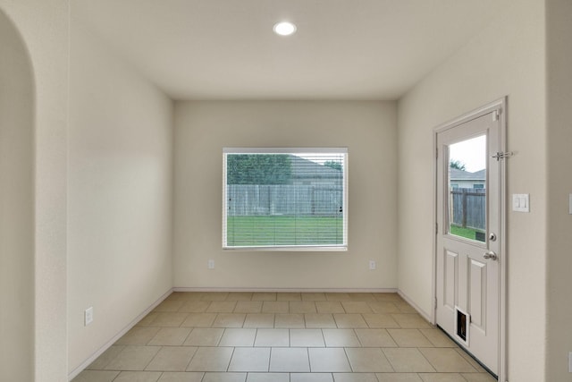 8213 White Hart Dr, Fort Worth, TX 76179 - foyer with healthy amount of natural light, recessed lighting, and light tile patterned floors