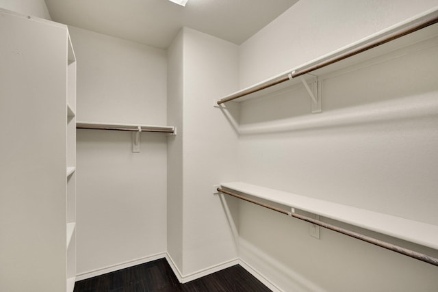 8213 White Hart Dr, Fort Worth, TX 76179 - walk in closet with dark wood-type flooring
