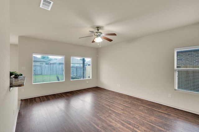 8213 White Hart Dr, Fort Worth, TX 76179 - spare room with a ceiling fan and dark wood finished floors