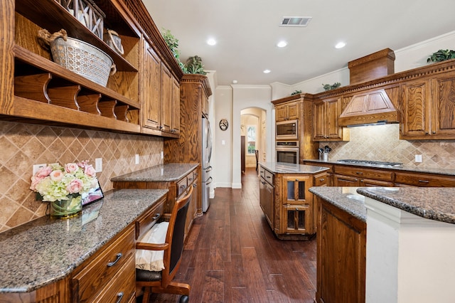 4651 Liam Dr, Frisco, TX 75034 - kitchen featuring arched walkways, open shelves, ornamental molding, brown cabinetry, and appliances with stainless steel finishes