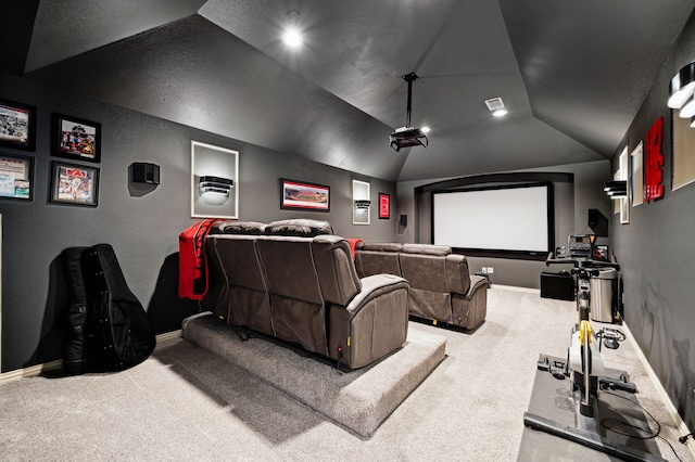 4651 Liam Dr, Frisco, TX 75034 - home theater room featuring carpet flooring, lofted ceiling, baseboards, and a textured wall