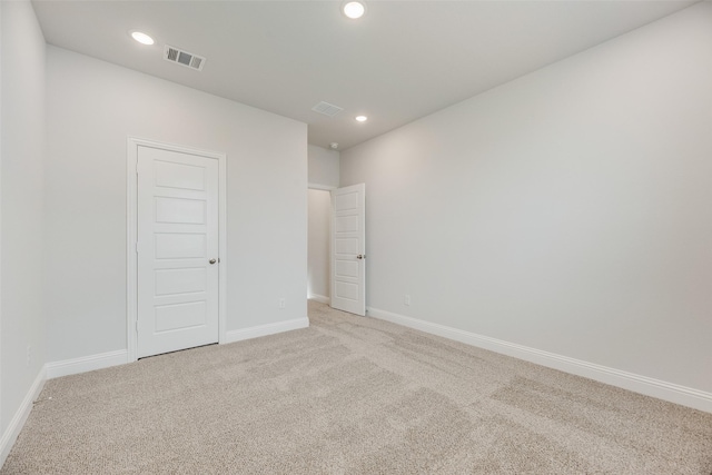 7113 El Matador Dr, Rowlett, TX 75088 - unfurnished bedroom with light colored carpet, baseboards, and recessed lighting