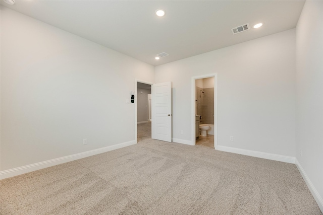 7113 El Matador Dr, Rowlett, TX 75088 - unfurnished bedroom featuring carpet flooring, baseboards, recessed lighting, and ensuite bath