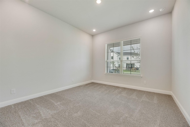 7113 El Matador Dr, Rowlett, TX 75088 - carpeted spare room with baseboards and recessed lighting