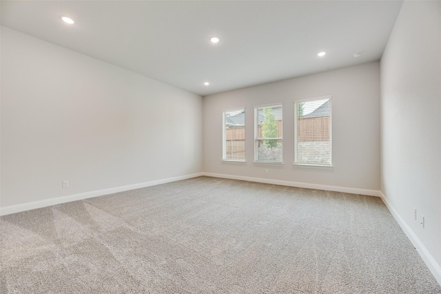 7113 El Matador Dr, Rowlett, TX 75088 - carpeted empty room with recessed lighting and baseboards