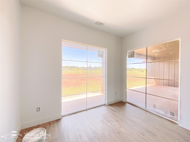 132 Pine Springs Cv, Tuscola, TX 79562 - empty room with baseboards and wood finished floors