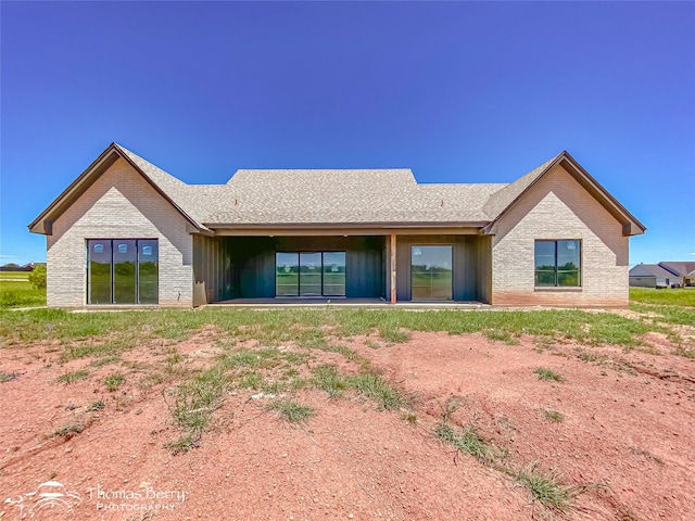 132 Pine Springs Cv, Tuscola, TX 79562 - rear view of property with brick siding
