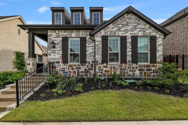 1806 Clouded Wren Dr, Arlington, TX 76005 - view of front of house featuring a front yard, stone siding, and stairway