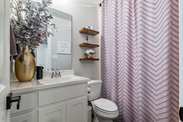 1806 Clouded Wren Dr, Arlington, TX 76005 - full bathroom with toilet, vanity, a textured wall, and a shower with curtain
