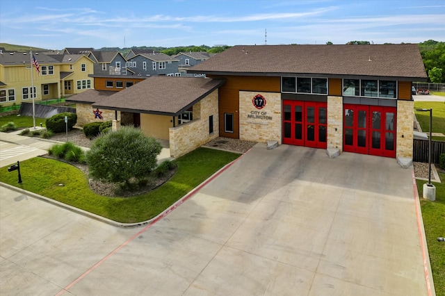 1806 Clouded Wren Dr, Arlington, TX 76005 - view of front of house featuring stone siding, a residential view, and roof with shingles