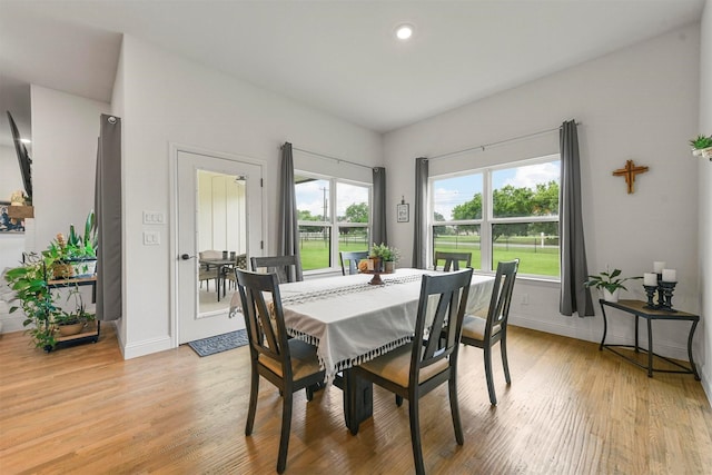 1511 Horseshoe Ct, Justin, TX 76247 - dining space with light wood-style flooring, baseboards, and recessed lighting
