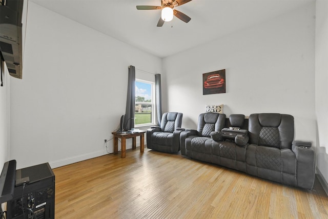 1511 Horseshoe Ct, Justin, TX 76247 - living room with a ceiling fan, wood finished floors, and baseboards