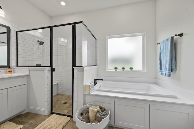 1511 Horseshoe Ct, Justin, TX 76247 - full bathroom with a shower stall, a garden tub, and vanity