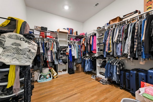 1511 Horseshoe Ct, Justin, TX 76247 - spacious closet featuring wood finished floors