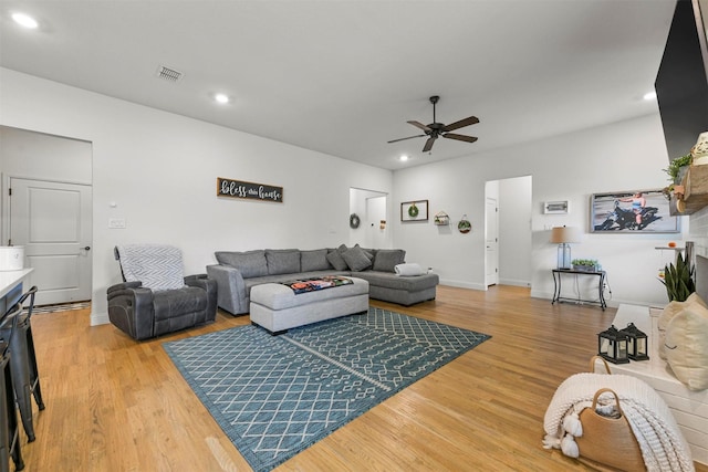1511 Horseshoe Ct, Justin, TX 76247 - living area featuring ceiling fan, light wood finished floors, recessed lighting, and baseboards