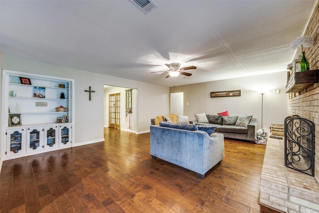 1507 Greenbrier Dr, Sherman, TX 75092 - living room with a ceiling fan, wood-type flooring, and a brick fireplace
