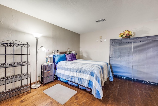 1507 Greenbrier Dr, Sherman, TX 75092 - bedroom with hardwood / wood-style flooring