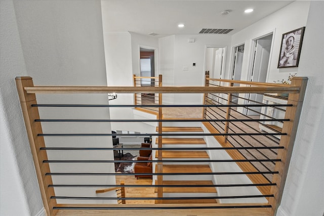 615 Louder Way, Fate, TX 75087 - corridor with baseboards, recessed lighting, and an upstairs landing