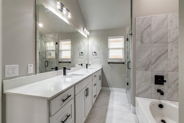 3235 Pine St, Dallas, TX 75215 - full bath featuring a shower stall, double vanity, baseboards, a tub to relax in, and tile patterned flooring