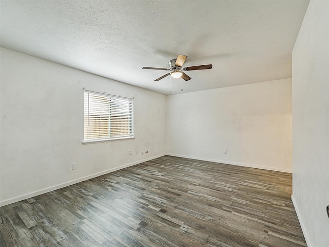 5632 Twitty St, The Colony, TX 75056 - unfurnished room with a ceiling fan, wood finished floors, and baseboards
