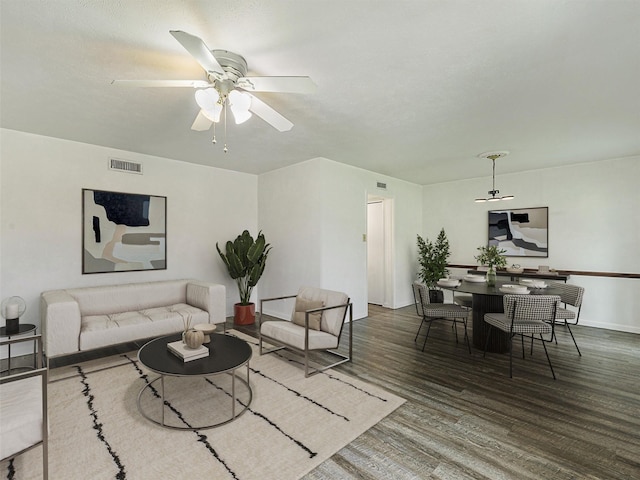 5632 Twitty St, The Colony, TX 75056 - living room with a ceiling fan, wood finished floors, and baseboards
