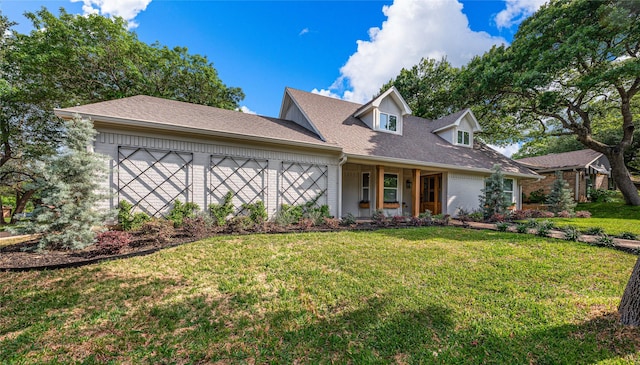9916 Sandalwood Dr, Woodway, TX 76712 - cape cod house with a garage, brick siding, a front lawn, and a shingled roof