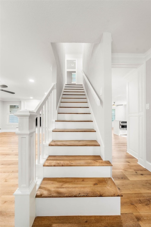 9916 Sandalwood Dr, Woodway, TX 76712 - stairway featuring ceiling fan and wood finished floors