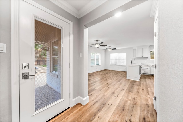9916 Sandalwood Dr, Woodway, TX 76712 - entryway with light wood finished floors, ornamental molding, baseboards, and ceiling fan
