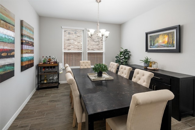 1619 Temperance Way, Wylie, TX 75098 - dining space featuring a chandelier, dark wood-style flooring, and baseboards