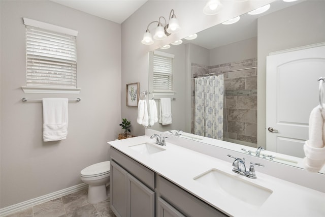 1619 Temperance Way, Wylie, TX 75098 - bathroom featuring baseboards, toilet, double vanity, tiled shower, and healthy amount of natural light