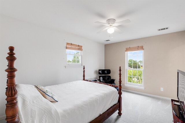 404 High Meadow Ln, Heath, TX 75032 - carpeted bedroom with multiple windows, baseboards, and a ceiling fan