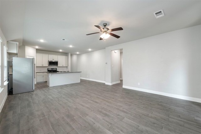 4142 Perch Dr, Forney, TX 75126 - kitchen featuring stainless steel appliances, open floor plan, baseboards, and recessed lighting