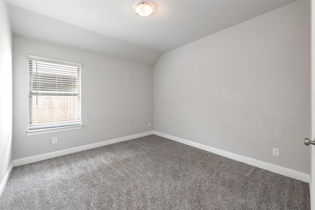 4142 Perch Dr, Forney, TX 75126 - carpeted spare room featuring lofted ceiling and baseboards