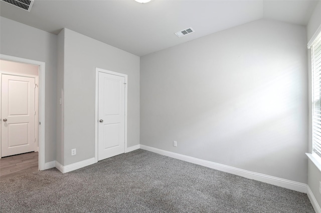4142 Perch Dr, Forney, TX 75126 - unfurnished bedroom with carpet, baseboards, and vaulted ceiling