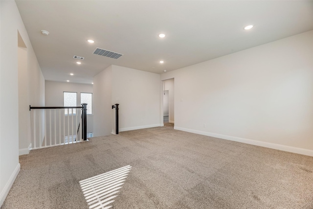 7107 Manhattan Dr, Rowlett, TX 75088 - carpeted empty room featuring recessed lighting, baseboards, and a smoke detector