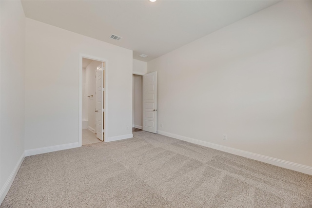 7107 Manhattan Dr, Rowlett, TX 75088 - empty room featuring light colored carpet and baseboards