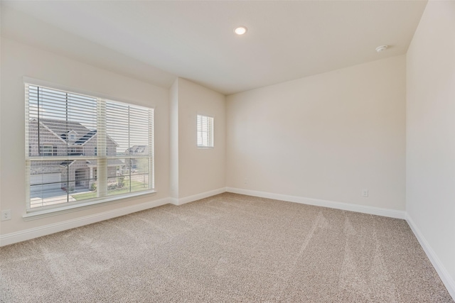 7107 Manhattan Dr, Rowlett, TX 75088 - spare room with light colored carpet, baseboards, and recessed lighting