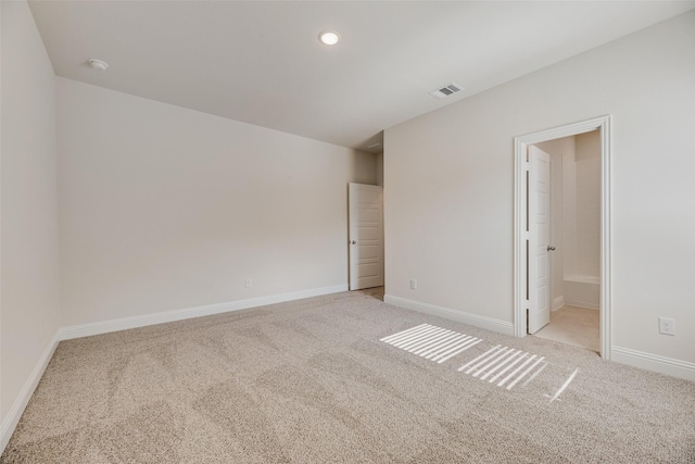 7107 Manhattan Dr, Rowlett, TX 75088 - unfurnished room featuring light carpet, baseboards, a smoke detector, and recessed lighting