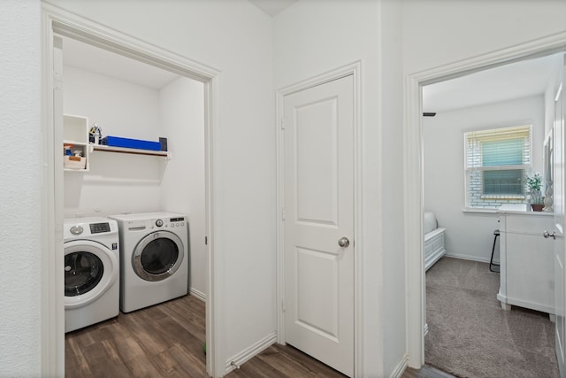 1701 Lake Grove Dr, Little Elm, TX 75068 - clothes washing area featuring washer and dryer, dark wood-style floors, and baseboards
