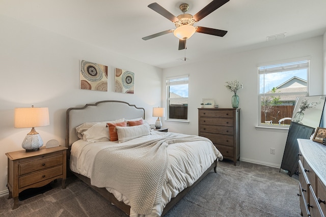 1701 Lake Grove Dr, Little Elm, TX 75068 - bedroom featuring dark carpet, baseboards, and a ceiling fan