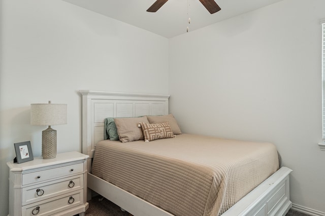 1701 Lake Grove Dr, Little Elm, TX 75068 - bedroom featuring dark colored carpet, ceiling fan, and baseboards
